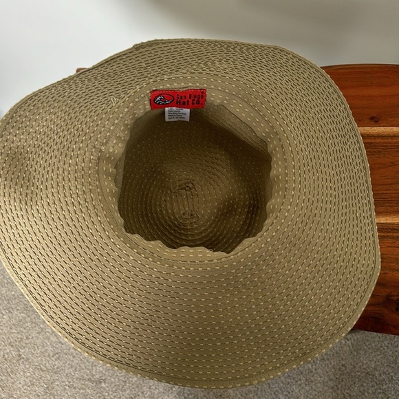 Never worn sun hat; olive/tan color with side straps. - Picture 3 of 3